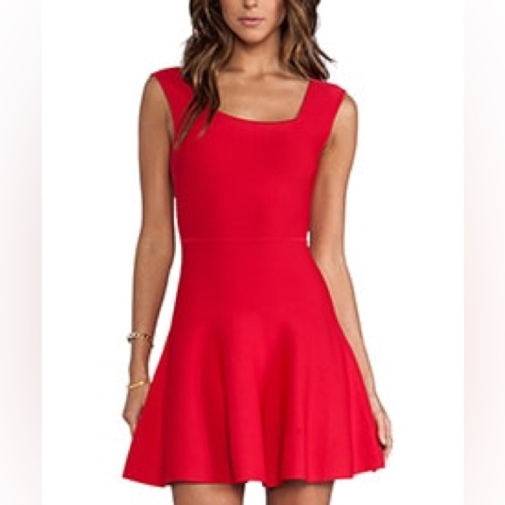 Red sleeveless peplum style dress